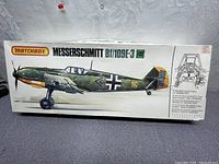 Box front showing artwork and branding for Messerschmitt Bf 109E-3 model kit