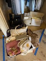 Full overview of assorted clutches and purses showing colors and styles