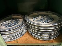 Two stacks of blue and white pattern sectioned plates by Wood & Sons.