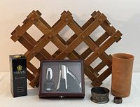 Photo of foldable wooden wine rack, Trudeau wine opener display case, Herzog wine aerator box, and some accessories