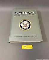 Full cover view showing the title 'U.S. Navy: A Complete History' with the U.S. Navy emblem and Naval Historical Foundation publisher imprint.