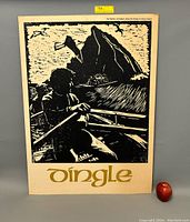 Full view of the black and cream woodcut print showing the rowboat with a figure rowing, rock formation, and seagulls, along with the stylized gold 'Dingle' text at the bottom.