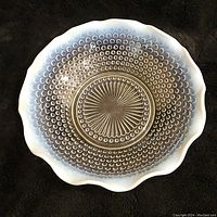 Top-down view of the Moonstone bowl showing the hobnail pattern inside, starburst center, and scalloped rim.