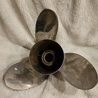 Top view of the three-blade propeller showing the full blade shapes and central hub