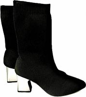 Pair of black heeled boots with reflective silver block heels, side and rear view