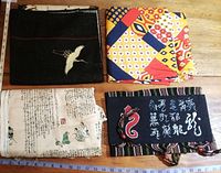 Overview of four folded Japan-themed fabrics showing colors, calligraphy, and motifs