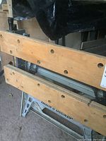 Close-up photo of wooden clamping jaws of the Black & Decker Workmate workbench.