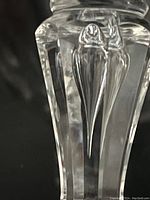 Close-up of the fine crystal stem showing bubble detail inside the stem, highlighting craftsmanship and clear crystal material.