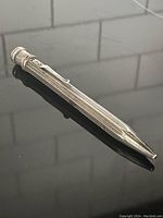 Full view of the USUS sterling silver mechanical pencil showing overall design and clip.