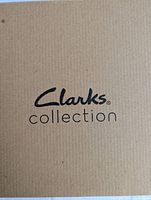 Top of the Clarks Collection shoe box showing brand logo.