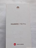White Huawei P30 Pro box front showing branding and Leica Quad Camera logo