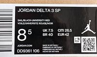 Label showing Jordan Delta 3 SP sneakers, size 8.5, Sail/Black-University Red colorway, model DD9361 106.