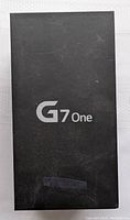 Closed LG G7 One phone box with visible surface wear