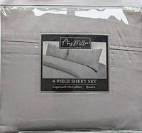 Packaged Amy Miller Home 4-piece sheet set in flint grey color.