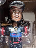 Close-up photo of the Vladimir Guerrero Jr bobblehead showing detailed features and jersey with number 27 and Toronto logo.