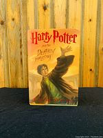 Front cover of dust jacket depicting Harry Potter and title