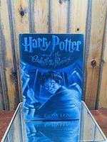 Front cover of the book showing the title and illustration of Harry Potter.
