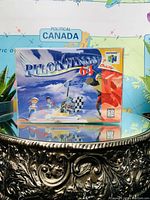 Front of the Pilot Wings 64 Nintendo 64 game box showing the title and artwork.