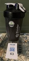 Black Blender Bottle shaker with a white flip-top cap, shown closed with branding visible