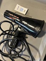 Wigo Classic 2800 HD blow dryer showing model name and brand on side.