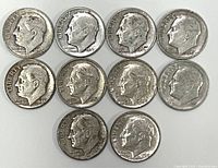 Obverse side of 10 Roosevelt silver dimes with visible dates including 1946, 1947, 1950, and 1964