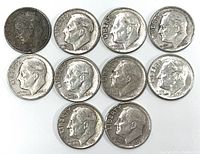 Top side of 10 Roosevelt silver dimes showing Roosevelt profile and LIBERTY inscription with dates visible on some coins.