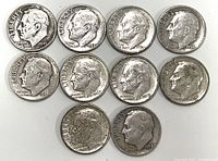 Obverse sides of 10 silver Roosevelt dimes showing President Franklin D. Roosevelt profile and mint years.