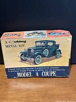 Photo of the front and top of the original box showing the green Model A Coupe artwork and kit details.