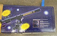 Box showing Bushnell Voyager refractor telescope with branding and product features.