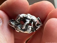 Top view showing lion attacking boar motif in high relief