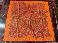 Full view of the scarf laid flat showing entire Legende Moghole pattern and signature