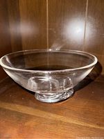Steuben Glass 8060 bowl, clear crystal with spiral base, side view showing shape and height.