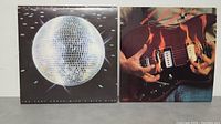 Photo shows both vinyl LP albums side-by-side: Joe Walsh with a disco ball cover, Savoy Brown with hands playing guitar cover.