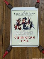 Full view of the Guinness A Sane Lunch Party Lewis Carroll themed poster showing the illustration and text.