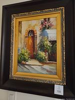 Framed oil painting showing entryway with wooden door, plants, and flowers, signed by artist.