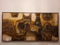 Frontal image of the rectangular wood panel art piece. Shows abstract textured shapes and earth tone colors with artist's signature and date in bottom right.