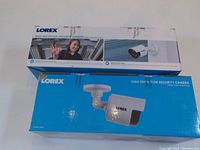 Two sealed Lorex LBV2531U 1080p security camera boxes showing the front and side views, including product images and branding.