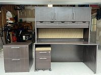 Full view of modern desk with hutch and two cabinets, showing structural details and condition.