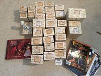 Overall assortment of boxed figurines, two loose figurines and three books