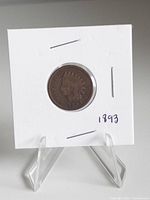 Obverse of 1893 Indian Head cent in holder