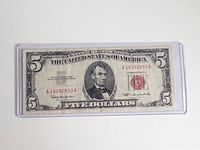 Obverse of the 1963 $5 red seal note in sleeve