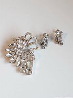 Brooch and both earrings overview