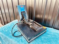 Front-left angle image showing overall machine and digital display