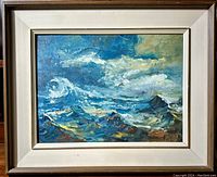 Full view of framed oil painting showing turbulent ocean storm with textured brushwork.