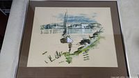 Framed watercolour artwork showing a boat in harbour with background buildings and dock, signed Birdsey