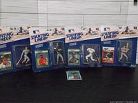 Full set of five Starting Lineup baseball figurines in original packaging, positioned side-by-side showing variety of players and packaging style.