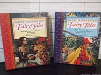 Two hardcover books titled Great Illustrated Fairy Tales with illustrated story characters on the cover.