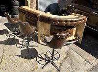 Front view of entire bar and all three stools