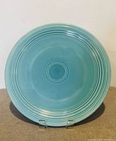 Front view of the robins egg blue Fiestaware platter showing the concentric circular design and glossy finish.