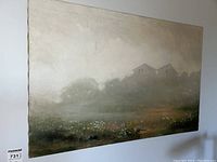 Full view of the painting hanging on a white wall showing the muted landscape with houses and flowers.